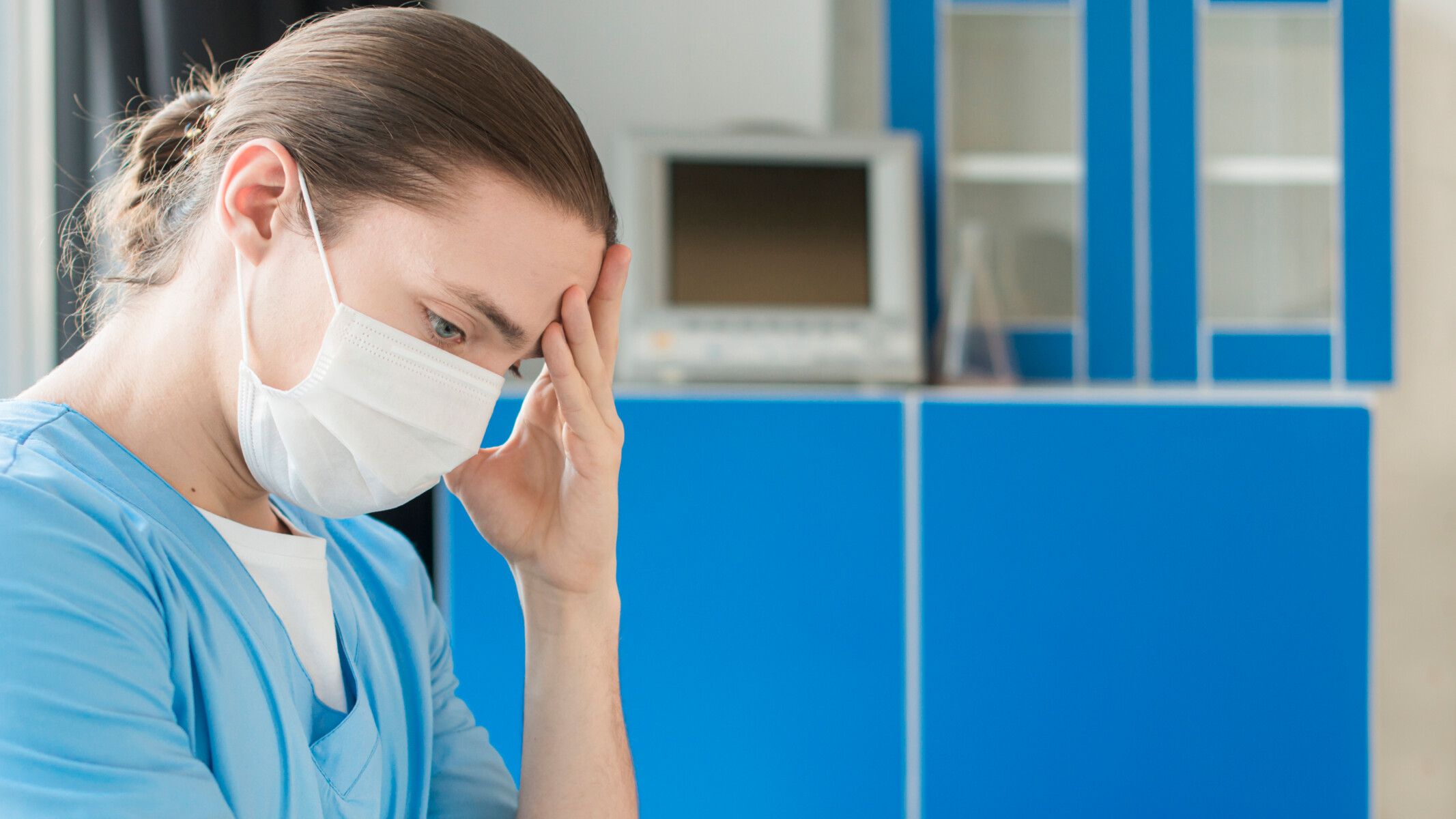 side-view-male-nurse-tired-scaled.jpg